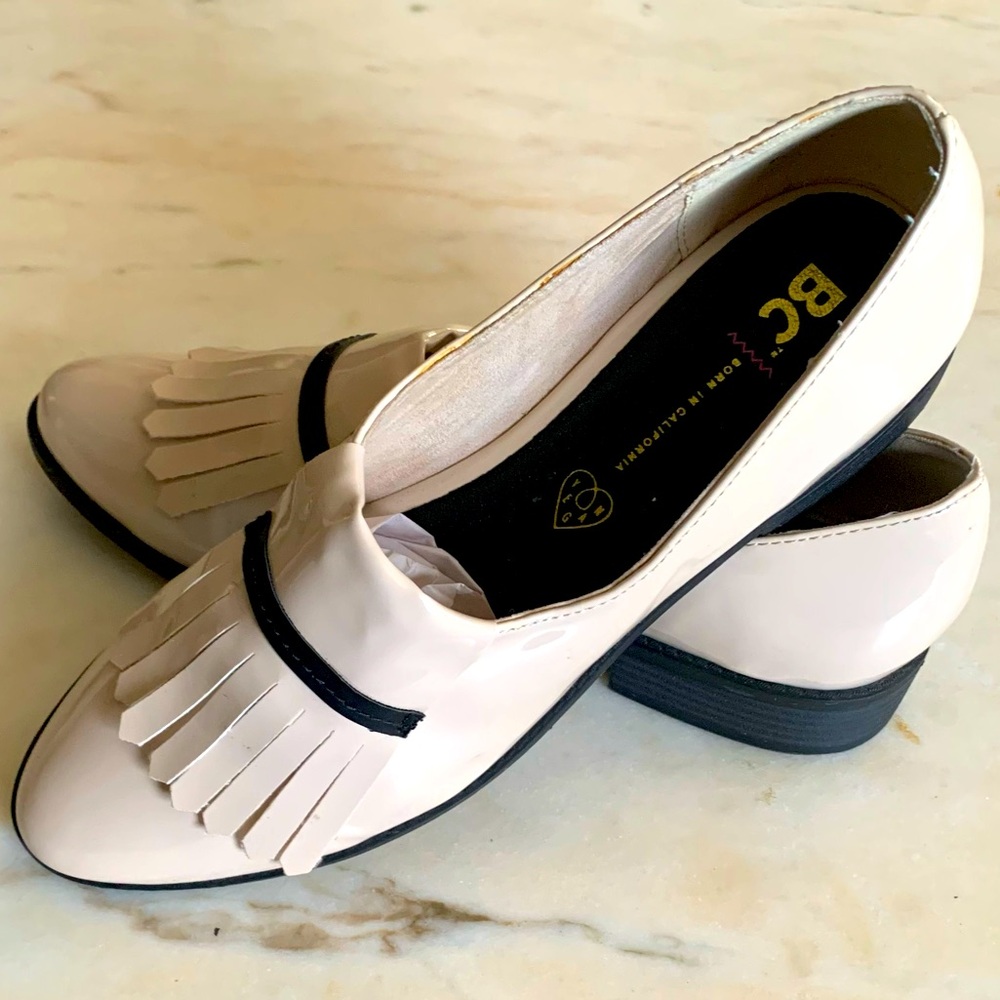 Beige loafers.